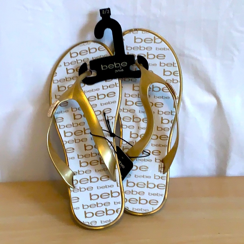 White & Gold BeBe flip flops